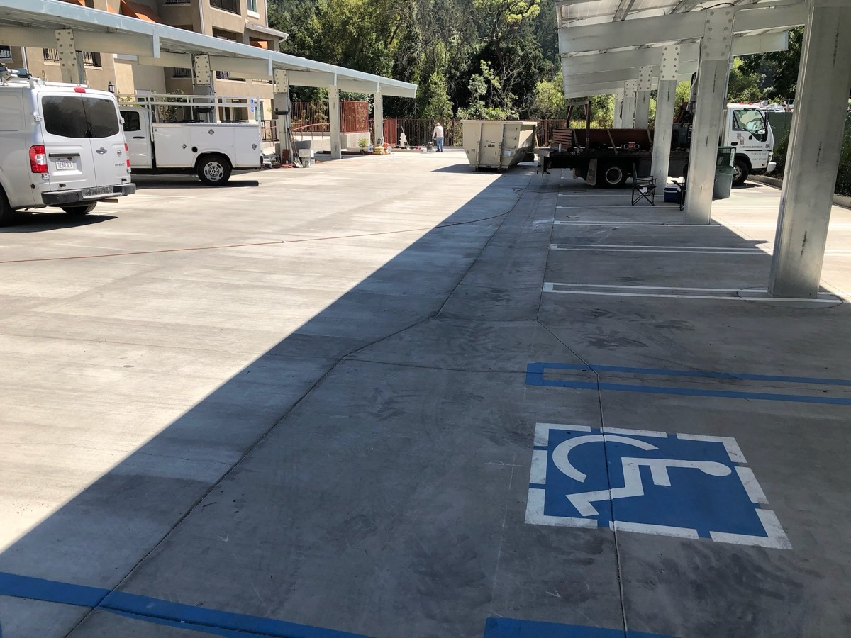 Finished commercial concrete parking lot with ADA striping