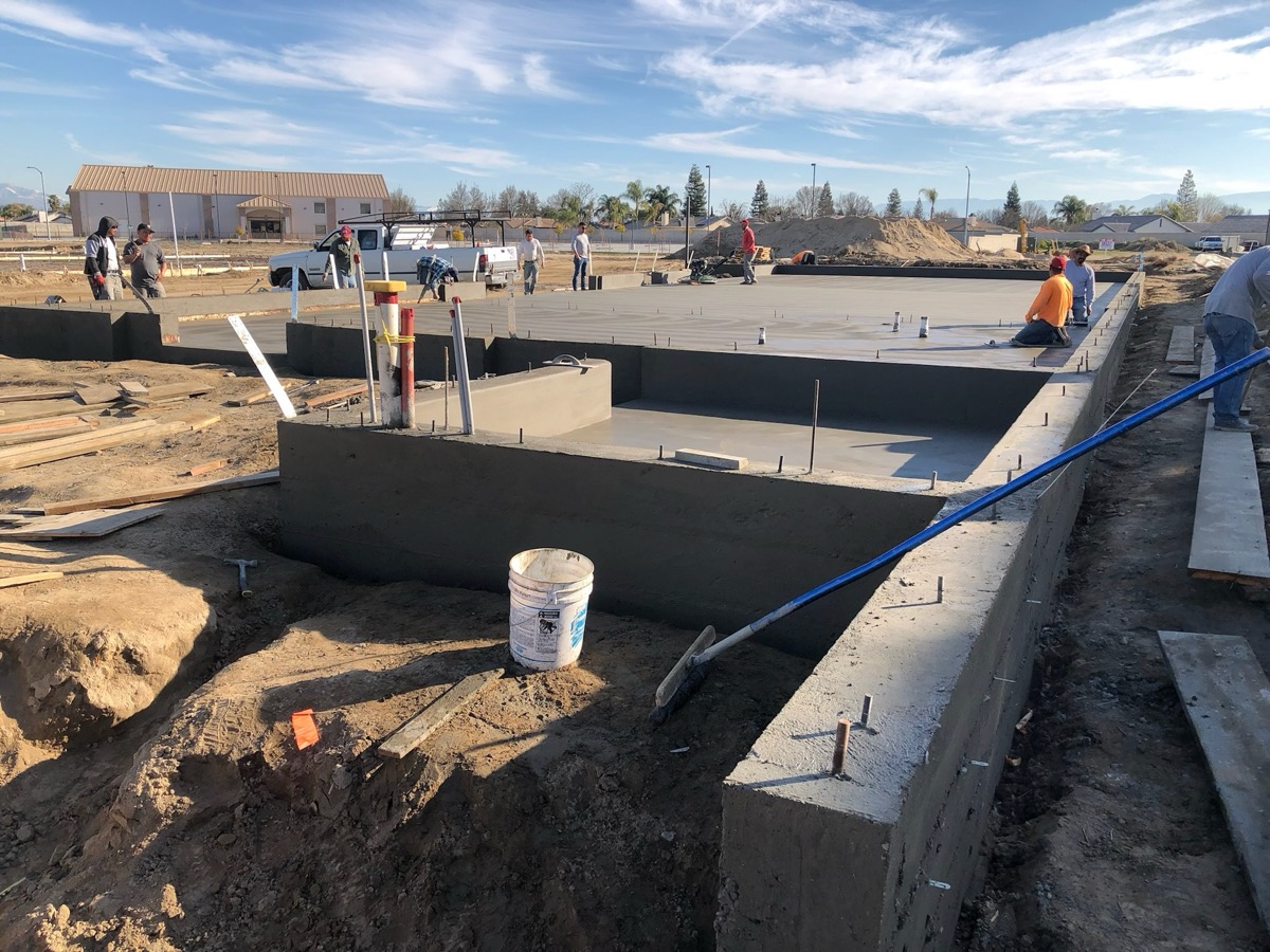 Villalobos crew forming and pouring concrete foundation stem walls
